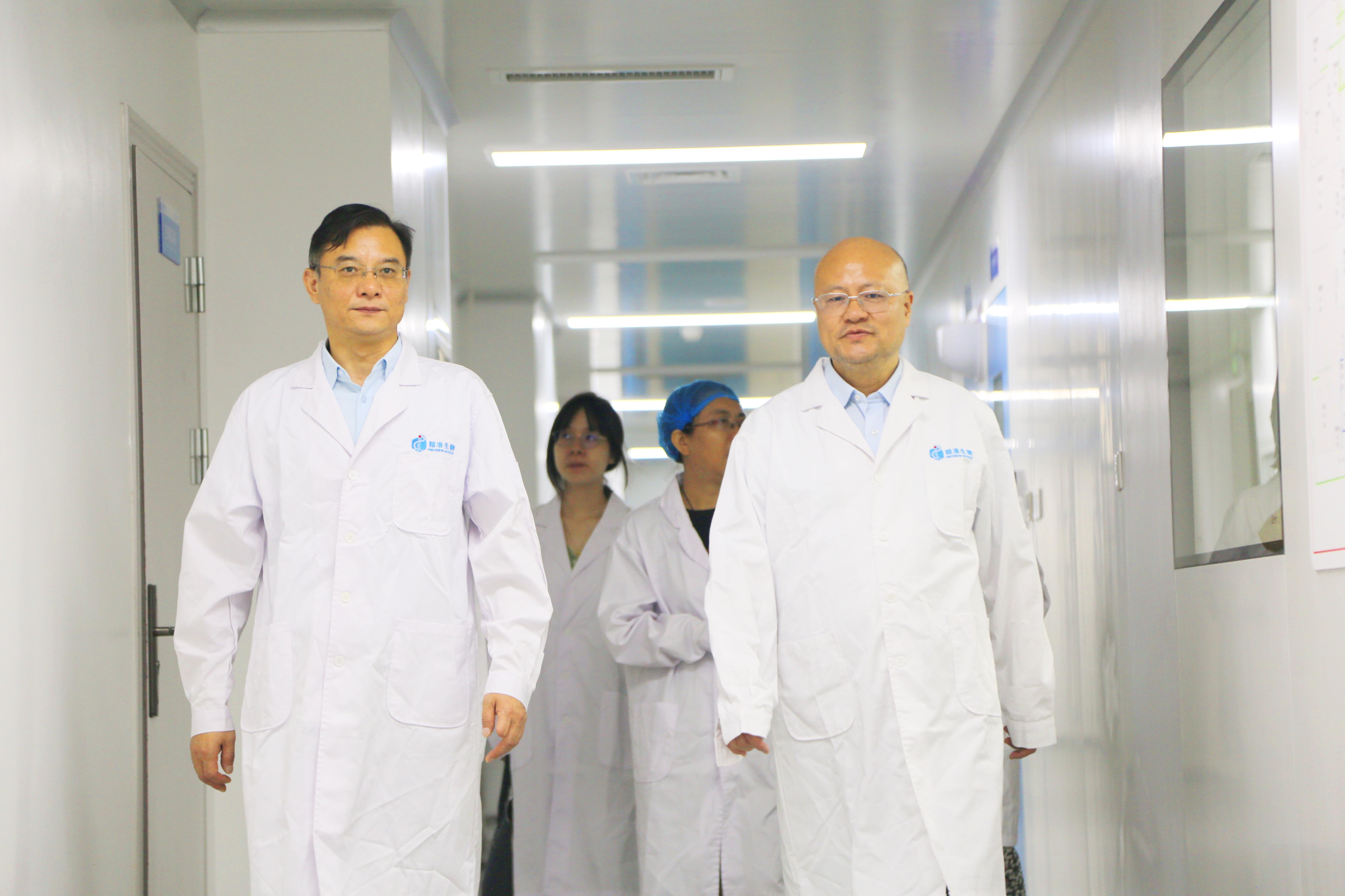 九龙坡区政协副主席周韬一行莅临重庆精准生物调研指导